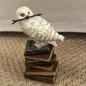 Harry Potter Magic Wand Snowy Owl On Book Stack Myth & Legend. See details